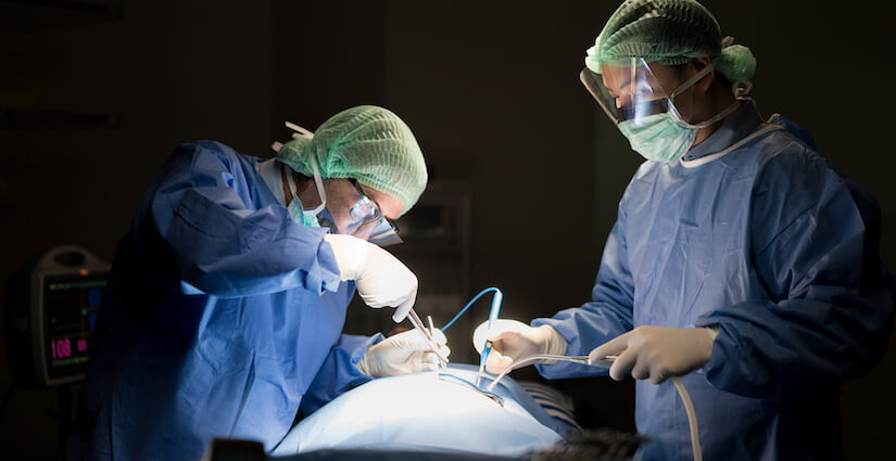 Vascular surgeon performing venous vascular surgery
