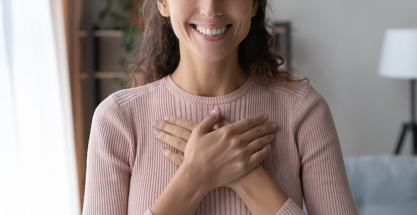 Woman smiling and heart healthy